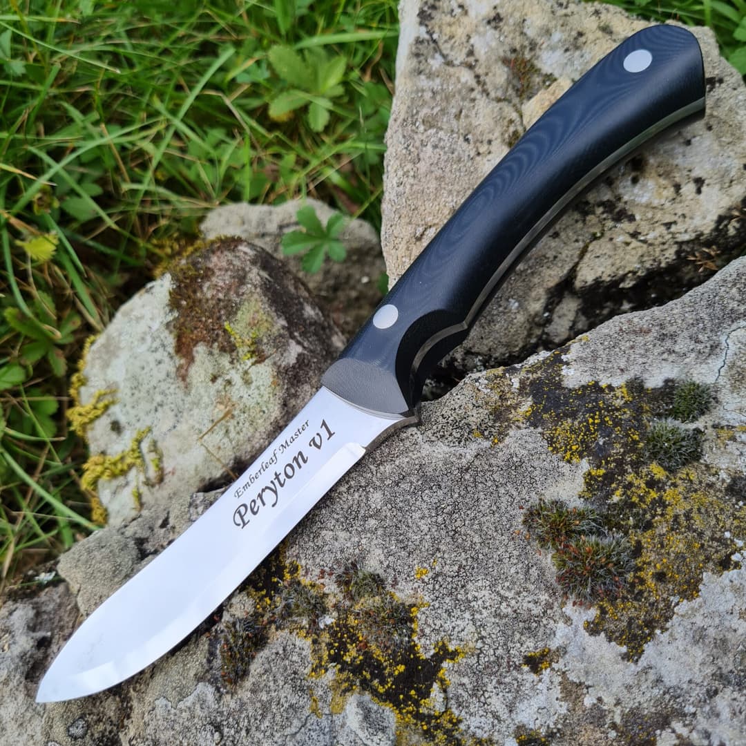 The Peryton v1 master, its blade engraved Emberleaf Master