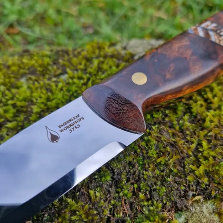 Close view of a Bran v2 blade, project 3755, showing one wide flat bevel running down to the edge